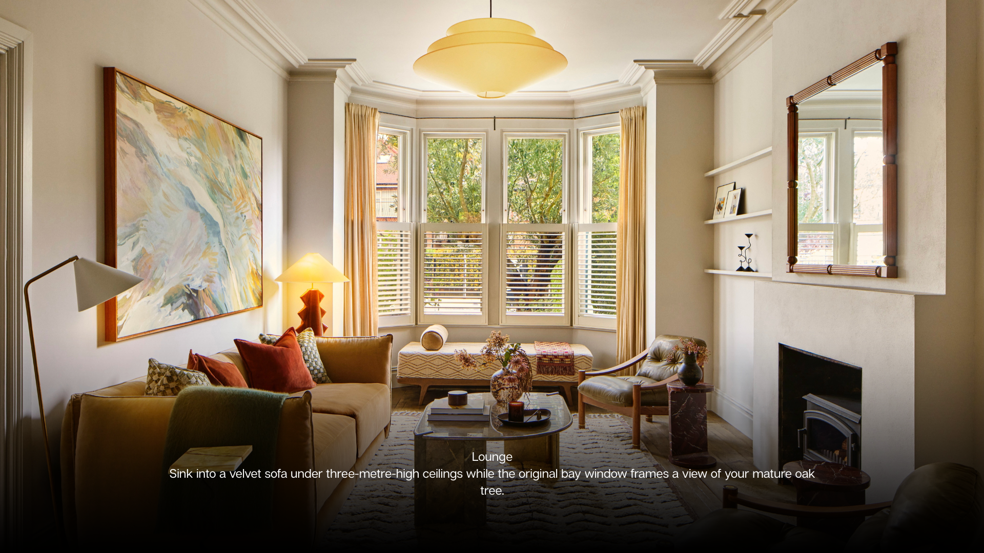 Living Room Make the most of cosy season in this living room where earth tones, velvet and wood creae warmth and spectacular windows frame garden views. Kitchen Island Take centre stage on a elect (6)